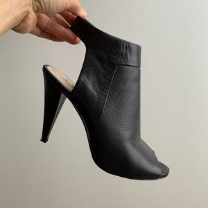 Louise et Cie Shoes - Heeled black bootie with cut outs. Louise et Cie Shoes - Heeled black bootie with cut outs.